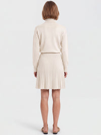 2-in-1 Strickkleid mit Rollkragen und Faltenrock | champagner