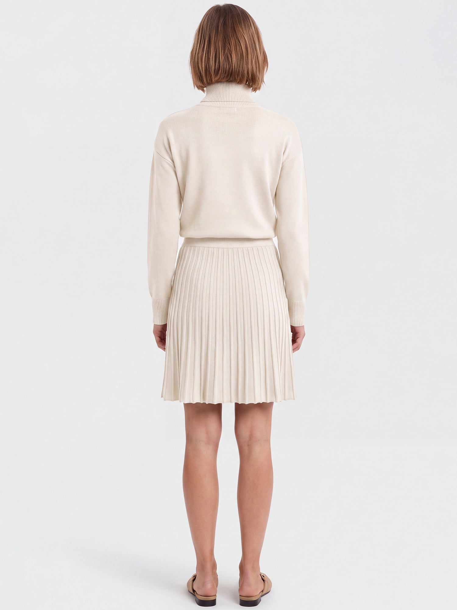 2-in-1 Strickkleid mit Rollkragen und Faltenrock | champagner
