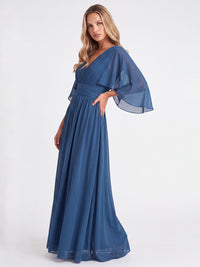 Abendkleid mit Drapierungen und Chiffonärmeln im Cape-Stil | petrol